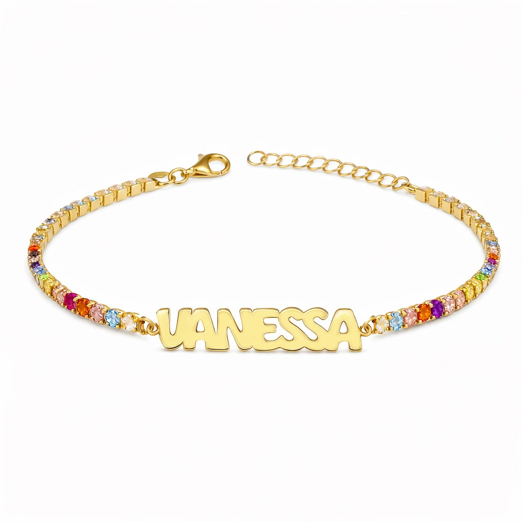 Pulsera tenis con nombre dorado en mayúsculas